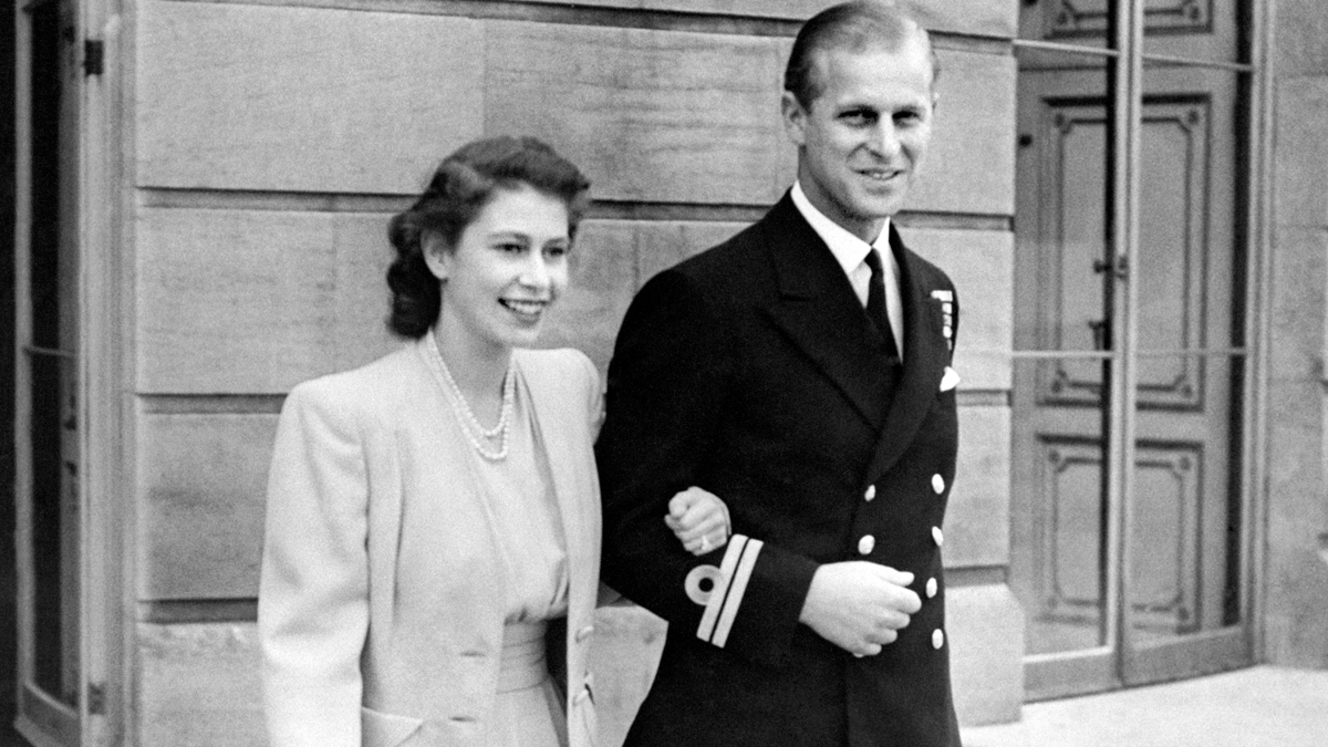 queen-elizabeth-and-prince-philip holding hands